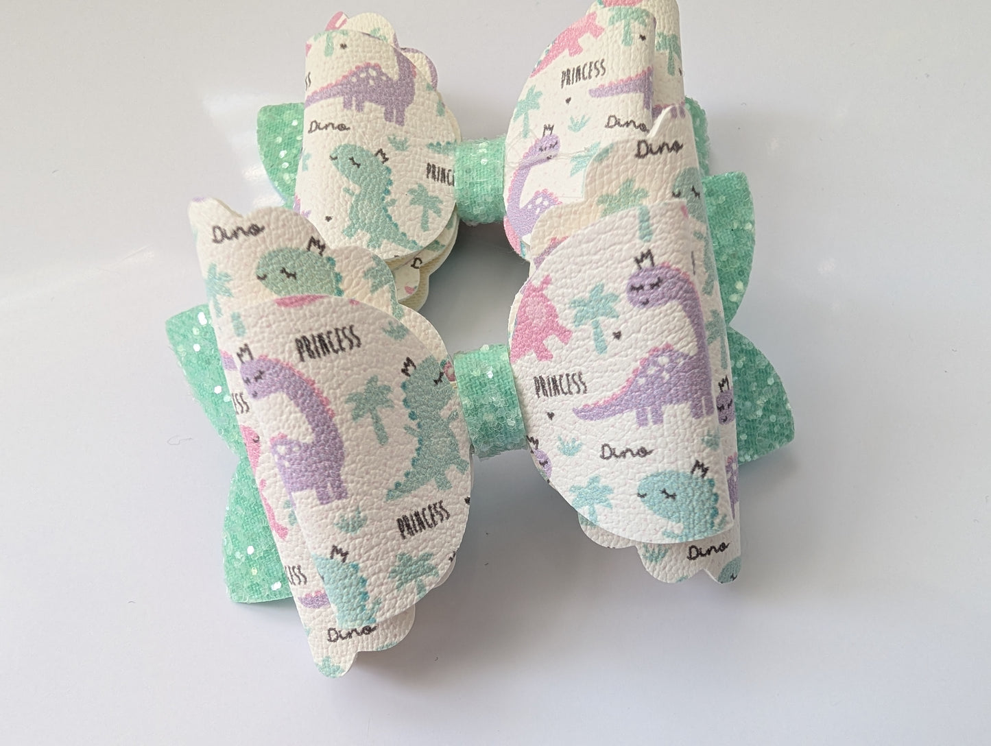 Triple dinosaur bow